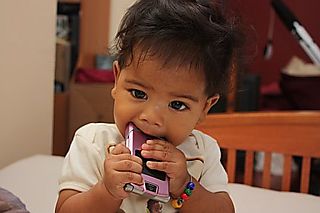 Kai eating cellphone